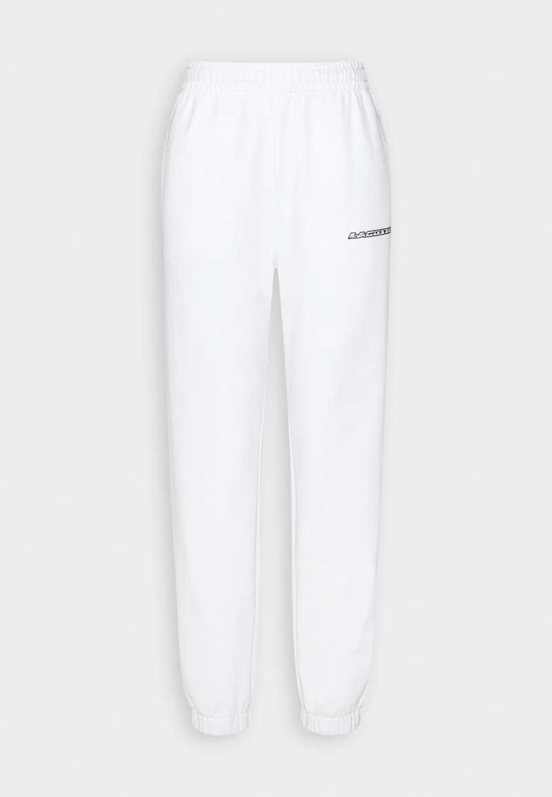 Lacoste Tracksuit bottoms white Zalando.de