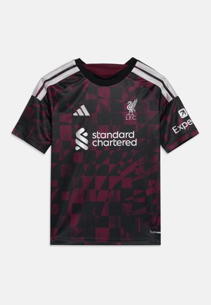 Μπλούζα ποδοσφαίρου της Liverpool FC με καρό μοτίβο σε μαύρο και βυσσινί χρώμα, με λευκές ρίγες Adidas και λογότυπα χορηγών μπροστά και στα μανίκια.