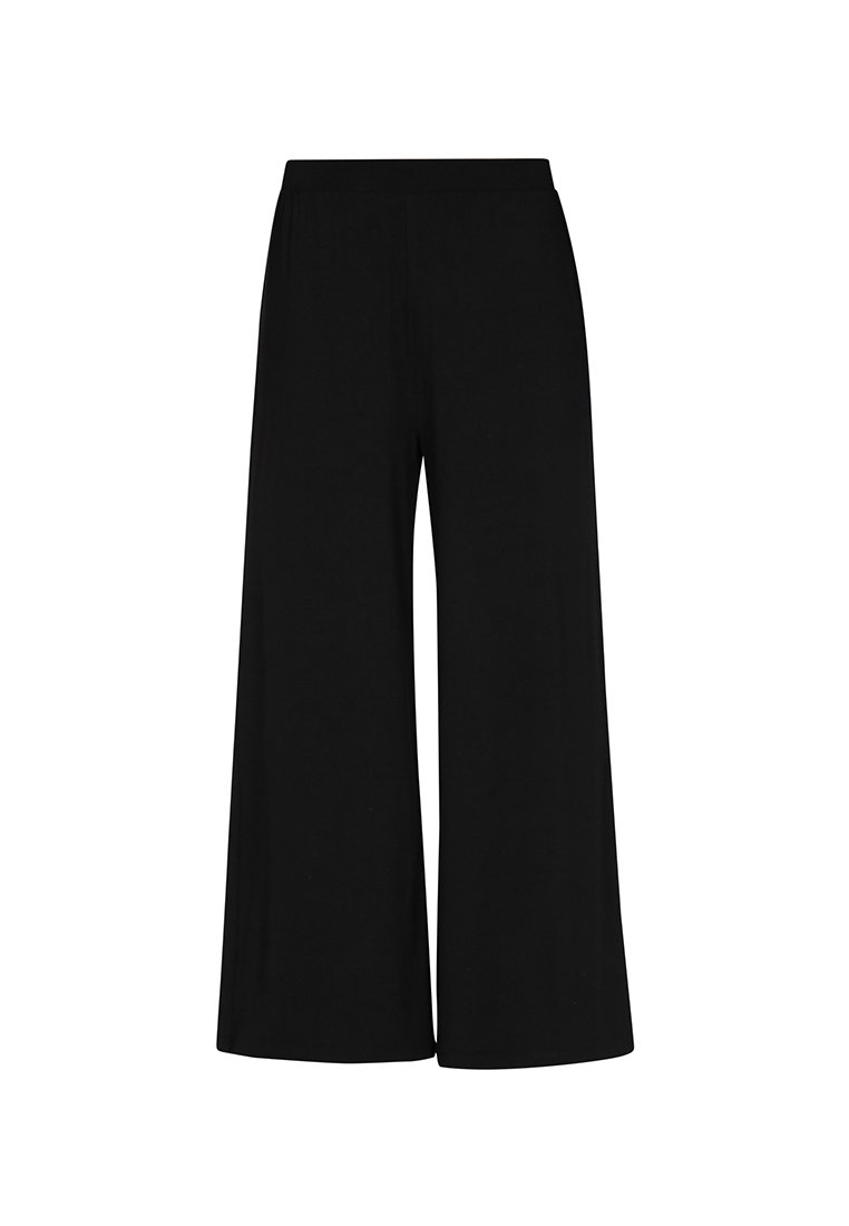 Schwarze weite Hosen mit elastischem Bund, hergestellt aus weichem, glattem Stoff, mit einem fließenden, lockeren Schnitt und minimalistischem Design.