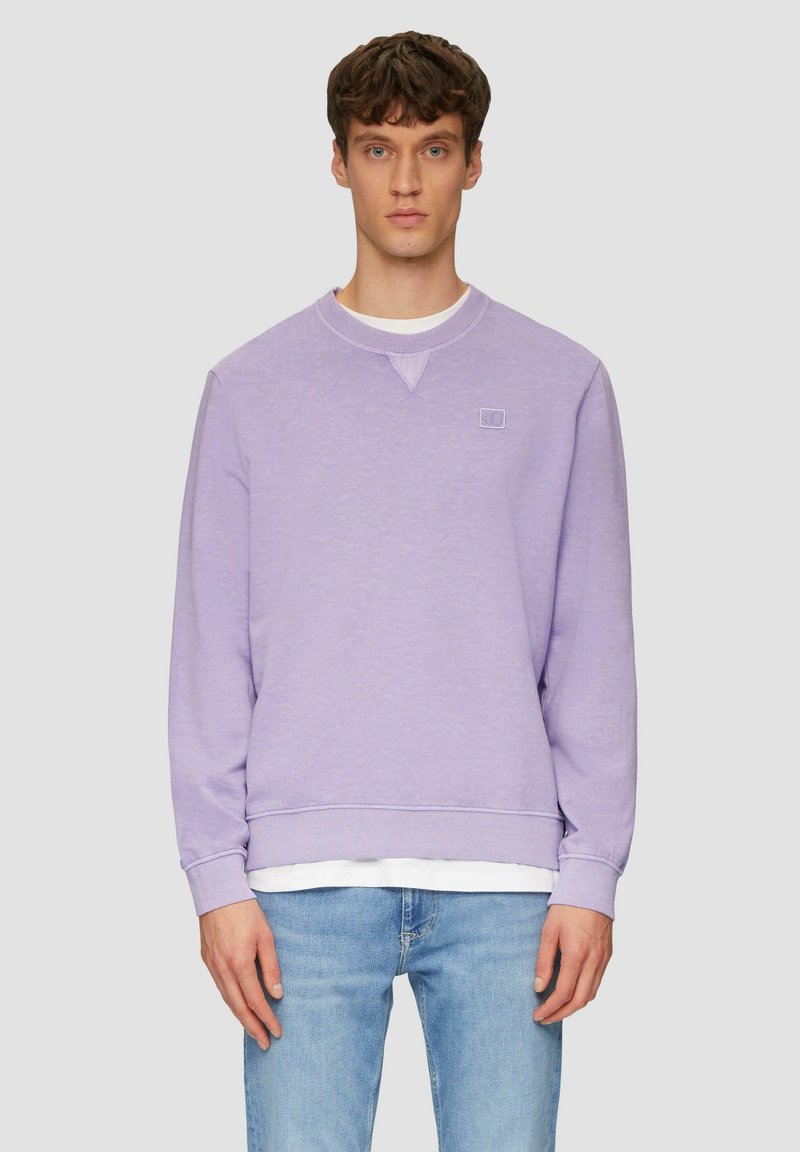 Felpa lavanda realizzata in misto cotone, con collo rotondo, polsini a coste, superficie testurizzata e un piccolo logo sul petto.