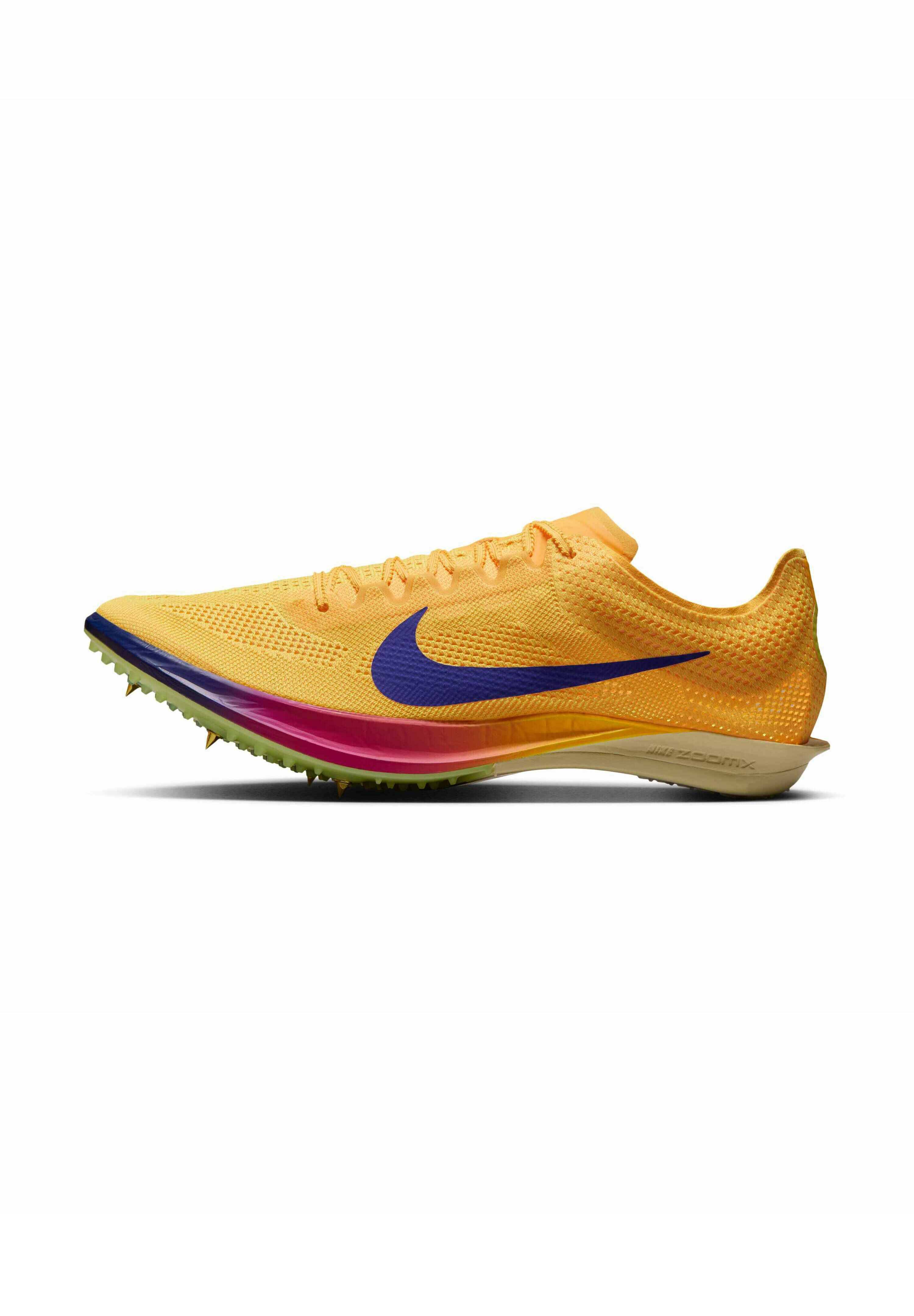 yellow and pink nike spikes