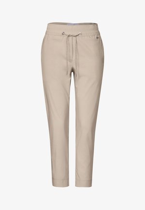 Beige, lightweight pants with an elastic waistband, drawstring closure, and cuffed ankles. Smooth texture and tailored design.