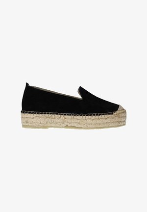 Zwarte suède espadrille met een jute touwzool, voorzien van een gesloten neus en instapontwerp. Platte zool met een versterkte teenkap.