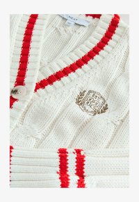 Nevybrané, ecru red tipped