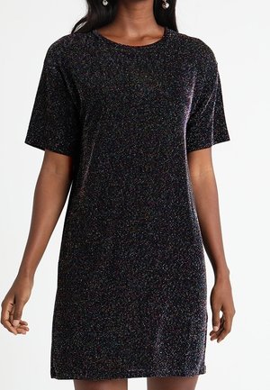 Black short-sleeve knee-length dress with subtle shimmer worn by a person with dark skin standing against white background.