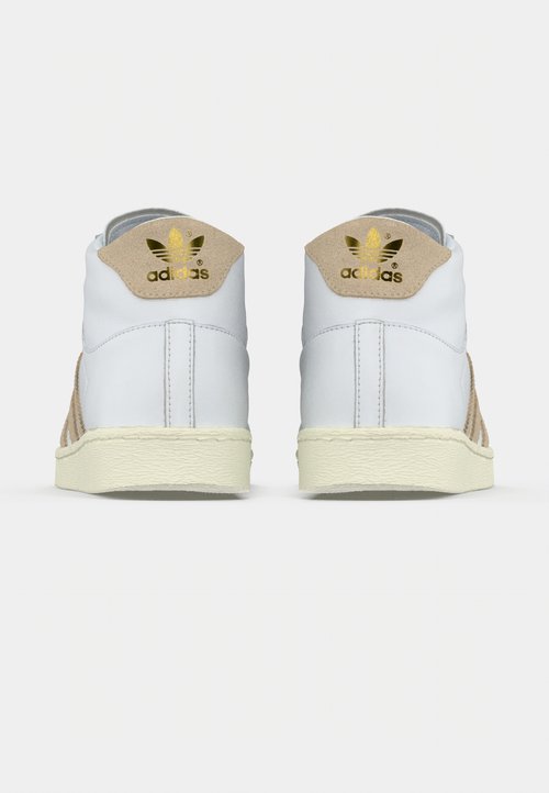 adidas Golf Originals SUPERSTAR PRO UNISEX - Golf shoes - chalk white/night  indigo/gold-coloured metallic/off-white - Zalando
