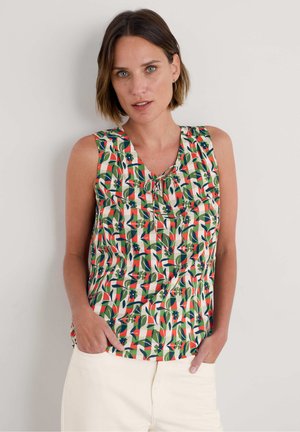Sleeveless top in a colorful floral pattern with green, red, and blue accents. Features a round neckline with a tie detail.