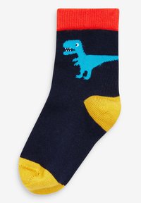 Marineblaue Socken mit rotem Bündchen, die ein blaues Dinosaurierdesign zeigen. Höhepunkte sind gelbe Akzente an Fußspitze und Ferse. Aus Baumwollmischung.