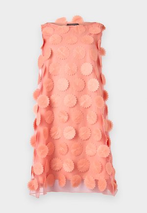 Pink sleeveless dress featuring a textured overlay of scalloped fabric circles, creating a three-dimensional effect. Smooth finish with vibrant color.