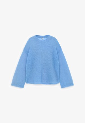Light blue pullover sweater made of soft, textured yarn. Features a round neckline and wide, long sleeves with a relaxed fit.