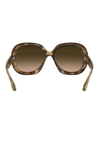 Occhiali da sole oversize con motivo tartarugato, lenti marroni sfumate e bracci trasparenti e slanciati. Sottotono in metallo sugli snodi.