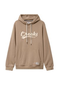 Beige Kapuzenpullover aus weichem Stoff, mit einer Fronttasche und Kordelzügen. Auf der Vorderseite befindet sich ein großes "Creeks"-Logo in einer kontrastierenden Farbe.