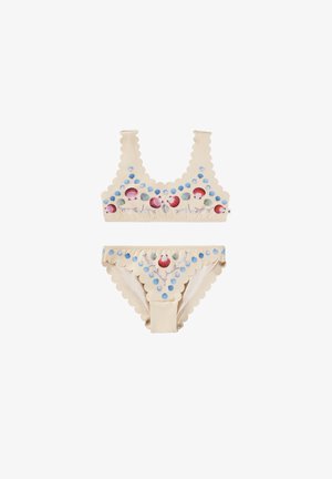 Two-piece swimsuit, beige with scalloped edges, featuring colorful shell and dot patterns. Soft fabric with moderate stretch.