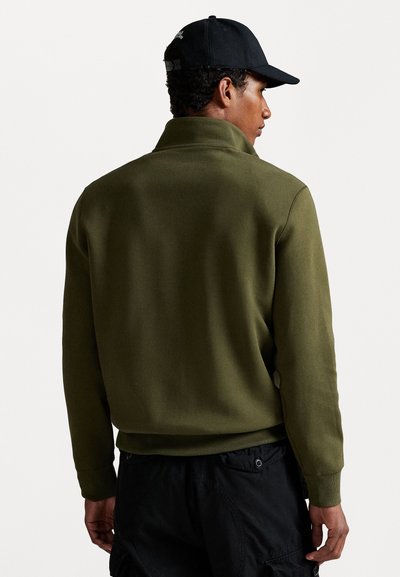 Olive green sweatshirt with a high collar and long sleeves, made of soft fabric. Back view shows smooth texture and minimal design.