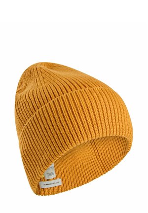 Geel gebreide beanie muts met ribbeltextuur en een opgerolde manchette. Heeft een stoffen label met tekst aan de binnenkant. Zacht acrylmateriaal.