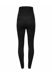 Leggings noirs taille haute, en tissu élastique, au design ajusté, avec deux poches arrière et une texture lisse.