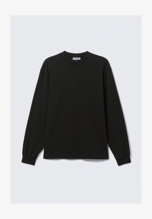 Black long-sleeve cotton t-shirt featuring a round neckline and ribbed cuffs, with a straight hem and minimal stitching details.