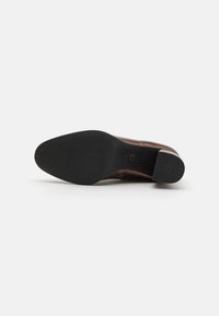Tamaris Botines - bronce