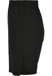Svarte bomullsshorts med elastisk midjebånd, sidelommer og rett ben-design, som slutter rett over kneet.