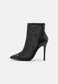 Bottines à talons hauts - black