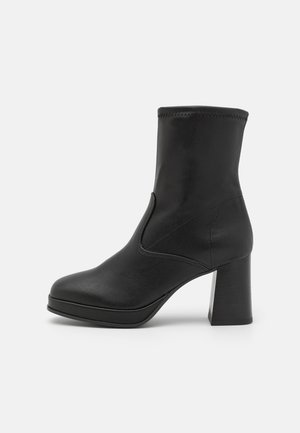 Platform ankle boots - black