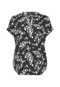 Svart kortärmad blus med vit blommönster, rund hals med lätt V-nick och lös passform.