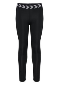 Svarta leggings gjorda av stretchigt material med en åtsittande design. Har en midja med chevronmönster i silver och texturerade sidor.