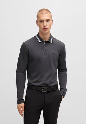 Long-sleeve polo shirt in dark gray fabric, featuring a contrasting striped collar, slim fit, and small logo detail on the chest.