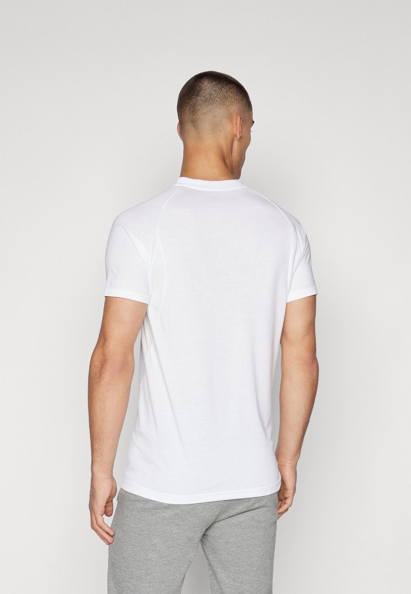 Puma TEE - Triko s potiskem - white