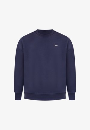 Marineblaues Sweatshirt mit Rundhalsausschnitt, gerippten Bündchen und Saum. Verfügt über ein kleines Logo-Tag auf der Brust. Hergestellt aus bequemem Stoff.