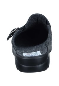 Gray felt slip-on shoe with a black rubber sole, featuring a backless design and a metal buckle accent on the side.