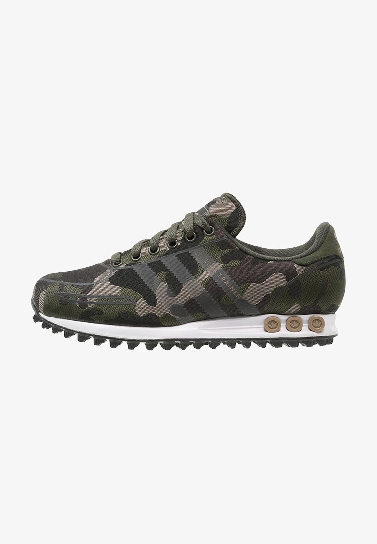 Camo athletic shoes with a predominantly green and gray textile upper, white midsole, and contrasting brown accents on the outsole.