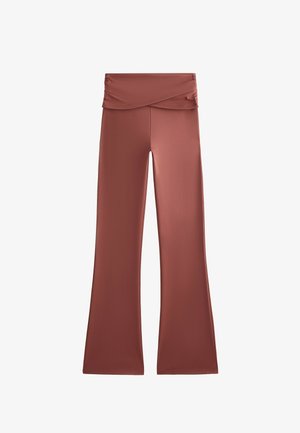 Braune Schlaghosen aus einem weichen, dehnbaren Stoff mit gerafftem, überkreuztem Bunddetail. Glatte Textur und langes Design.