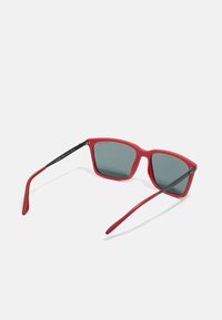 Armani Exchange Ochelari de soare - matte red