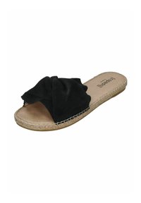 Black suede slide sandal with a large knotted bow on the upper. Features a tan insole and braided jute-inspired outsole.