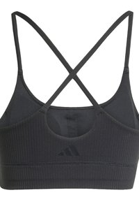 Sujetador deportivo negro con estrías, con tirantes entrecruzados y espalda redonda. Presenta un corte circular y un logo de Adidas en la esquina inferior izquierda.