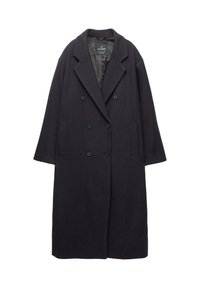 Cappotto doppiopetto in lana blu scuro, con colletto a revers, due tasche frontali e grandi bottoni. Tessuto morbido e vestibilità over.