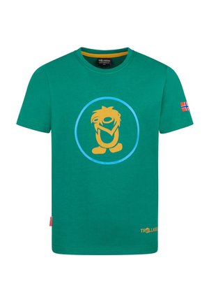 Green short-sleeve children’s t-shirt with yellow cartoon character inside a blue circle on front and small Norwegian flag on left sleeve.