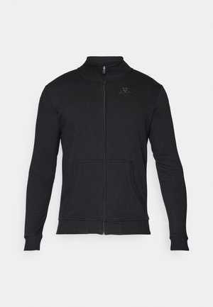 Svart zip-up sweatshirt med hög krage, långa ärmar, två framfickor och en diskret logo på bröstet. Slät bomullstextur.