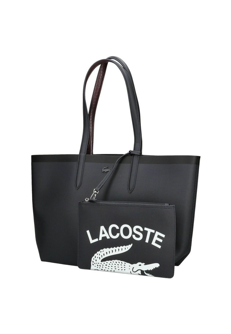 Borsa tote nera con manici texturizzati, dotata di una pochette nera removibile con logo bianco Lacoste e grafica del coccodrillo. Materiale liscio.