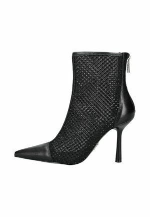 Højhælede pumps - black mesh e