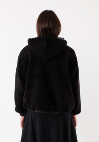 Deha Fleecetakki - nero