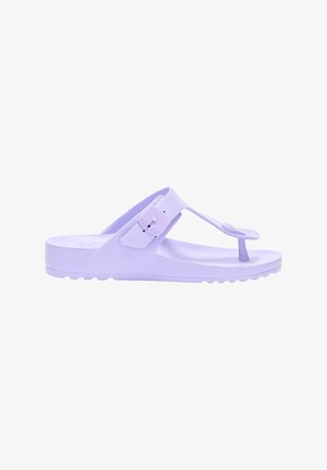 Single lavender thong sandal with adjustable buckle strap and textured sole, side view on white background.