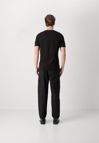 Tommy Hilfiger TEE - Μπλουζάκι με στάμπα - black