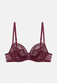 Soutien-gorge en dentelle bordeaux avec armatures, bonnets semi-transparents, bretelles ajustables et bords festonnés sur les bonnets et la bande, présentant des détails délicats.