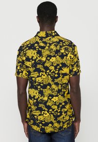 Koroshi SHORT SLEEVE - Ing - amarillo yellow