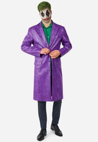 Purple faux leather long coat with textured finish, double-breasted buttons, and two front pockets; worn over green shirt and black pants.
