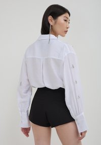 Calliope Hemdbluse - bianco