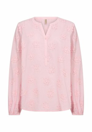 Rožinė ilgomis rankovėmis palaidinė su V formos iškirpte ir sagų juostele. Turi tekstūruotą floristinę siuvinėjimą visame audinyje ir surinktas rankogalius.