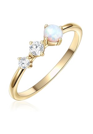 Gold ring featuring three gemstones: two clear round diamonds and a central opal stone, set in four prongs, with a smooth band.